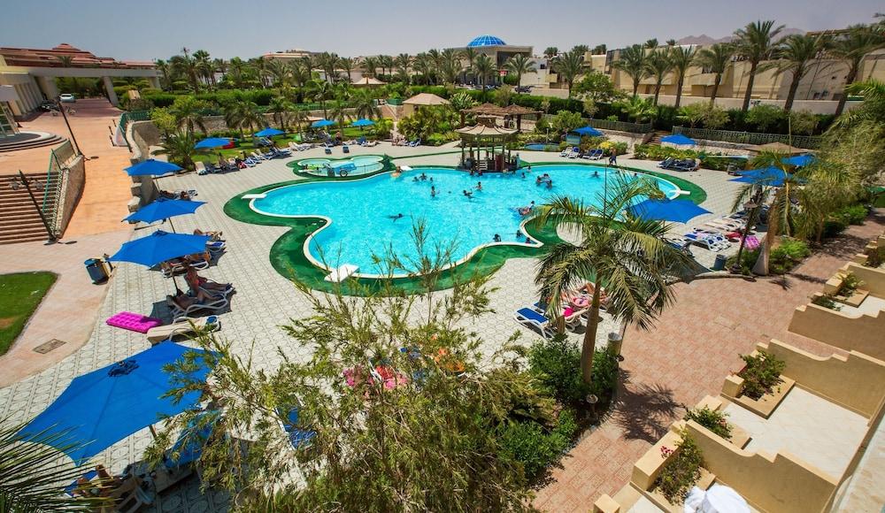 Aurora Oriental Resort Sharm El Sheikh Exterior foto The swimming pool at the Hilton Luxor